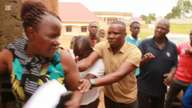 Chaos at School as Students and Teachers Shield Director from  Parents in Road Dispute