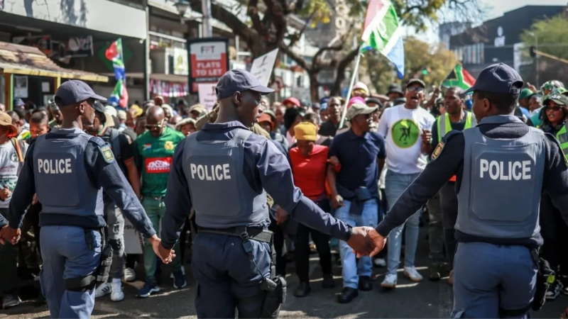Thousands of anti-migrant protesters march in South Africa amid heavy police presence